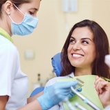 Woman smiling in the dental chair