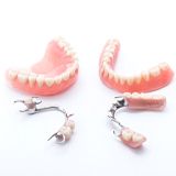 two full dentures and two partials