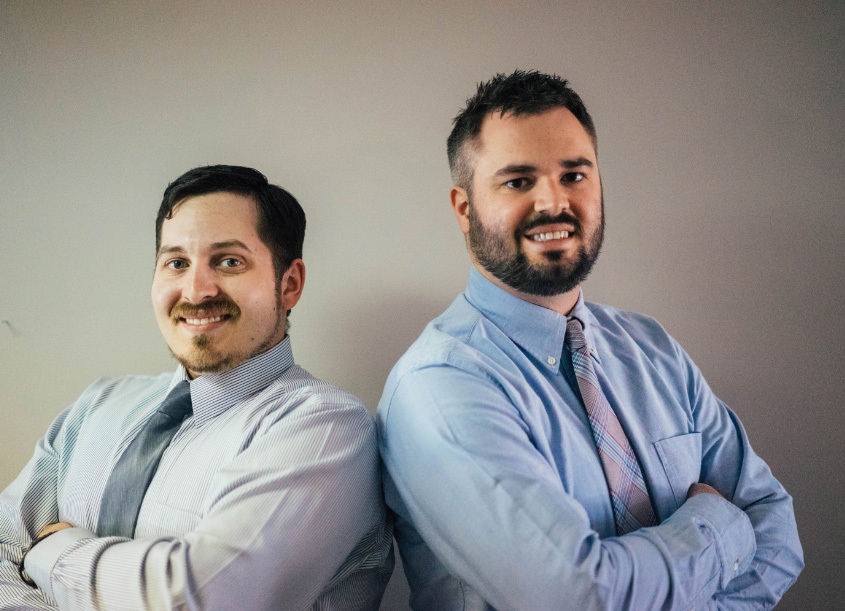 photo of Dr. Orneleas and Dr. Berquist smiling