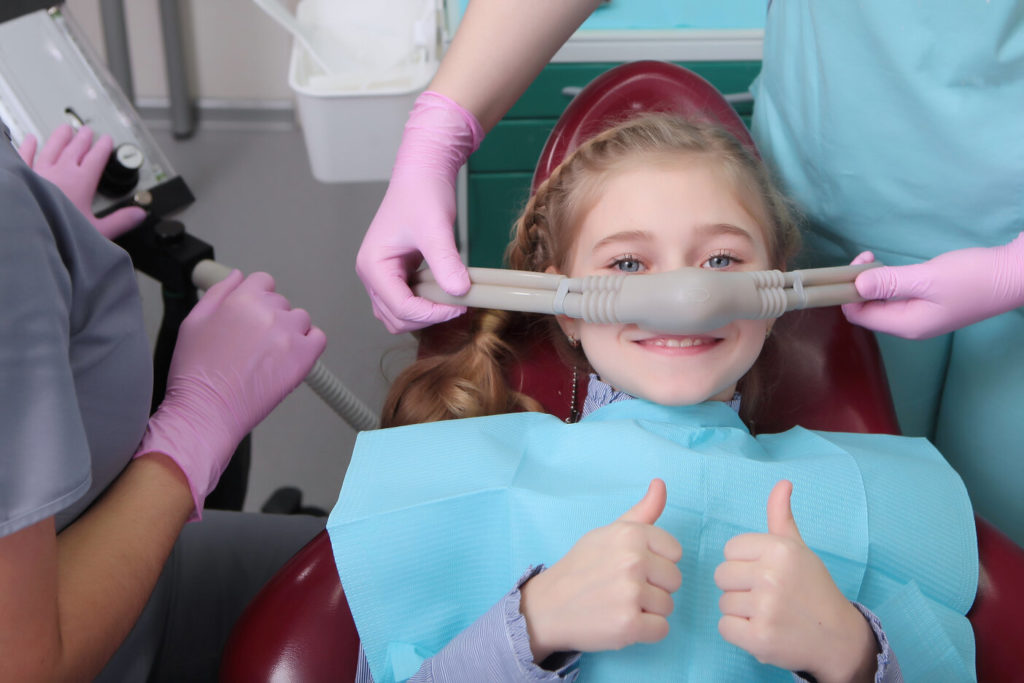 smiling patient undergoing dental sedation