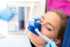 a woman receiving nitrous oxide at the dentist