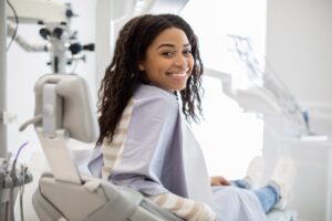 happy dental patient after getting their smile fixed
